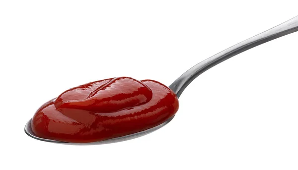 Ketchup en cuchara aislada sobre fondo blanco — Foto de Stock