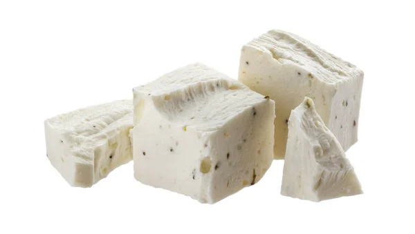 Griekse feta blokjes, blokjes zachte kaas geïsoleerd op witte achtergrond — Stockfoto