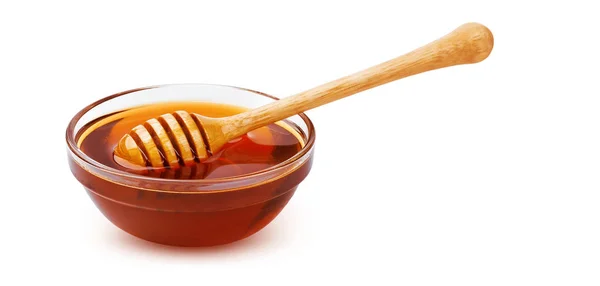 Méz bottal és méz elszigetelt fehér background vágógörbével tál — Stock Fotó