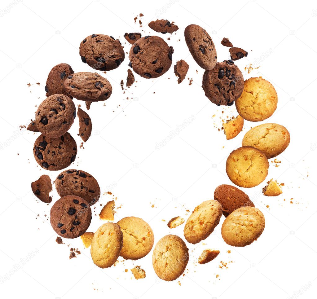 Round frame made of falling broken chip cookies isolated on white background