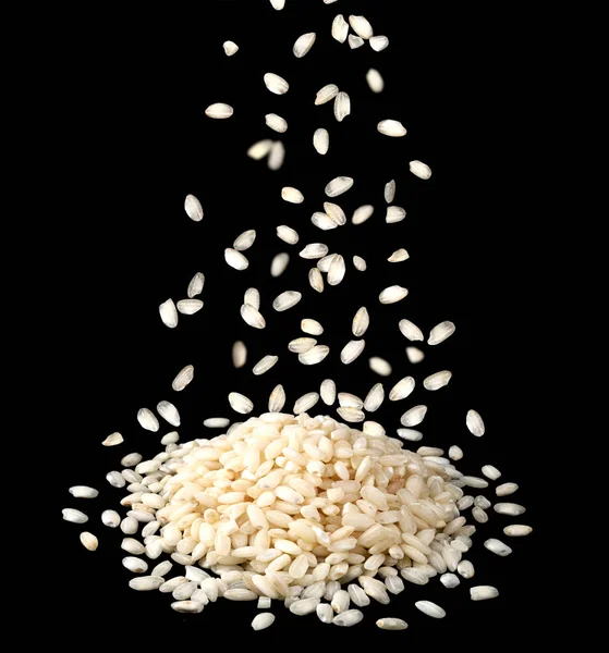 Falling Risotto Rice Groats Isolated Black Background Closeup — Stock Photo, Image