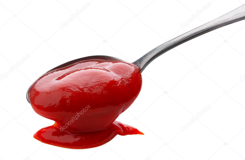 Flowing ketchup isolated on white background with clipping path, tomato sauce with metal spoon