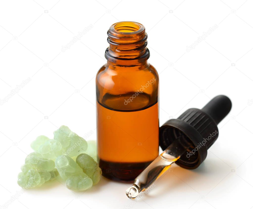 Frankincense essential oil isolate on white