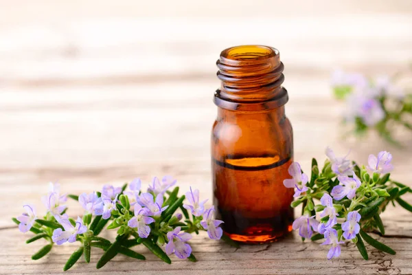 Rosemary Essential Oil Flowers Wooden Board — Stock Photo, Image