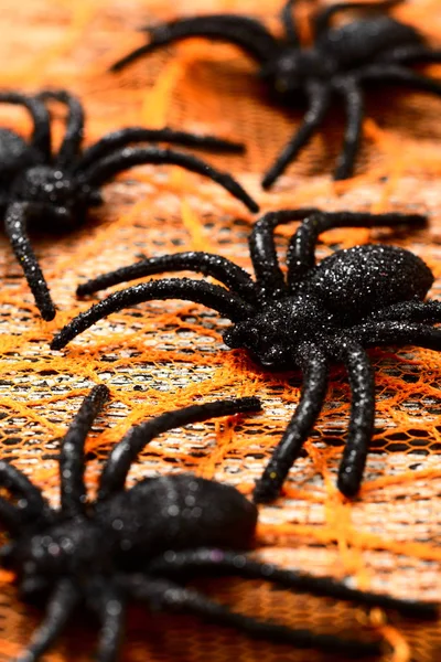 Schwarze Spinnen Auf Orangefarbenem Hintergrund — Stockfoto