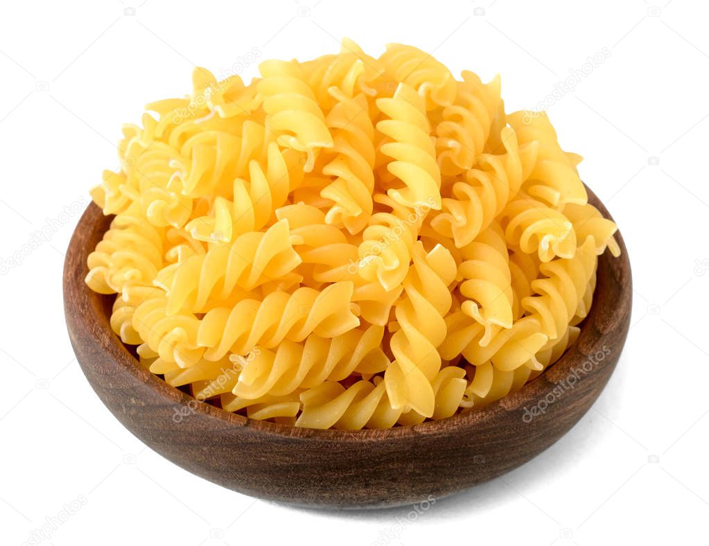 fusilli pasta in the wooden plate