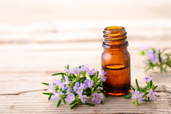 Rosemary Massage Oil Flowers Wooden Board — Stock Photo, Image