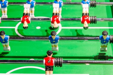 Masa futbolu, futbol oyuncusu metal çubuklar üzerinde rakamlar.