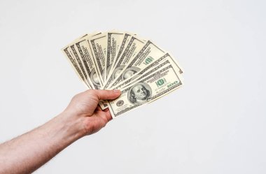 İnsaneli Amerikan doları para tutar. Finans, kazanç, kredi