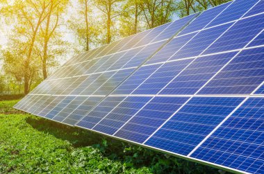 Power plant using renewable solar energy with sun clipart