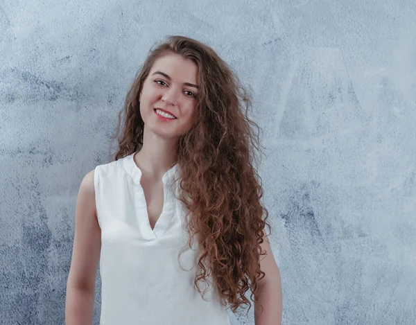 Beautiful Laughing Girl Long Curly Hair Portrait Waist Blue Gray — Stock Photo, Image