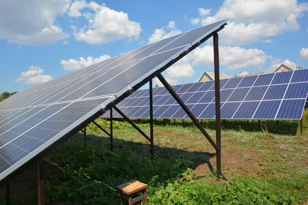 Backyard solar panels for residential house energy efficiency.
