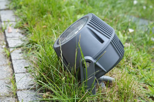 Garden outdoor lighting in the lawn grass