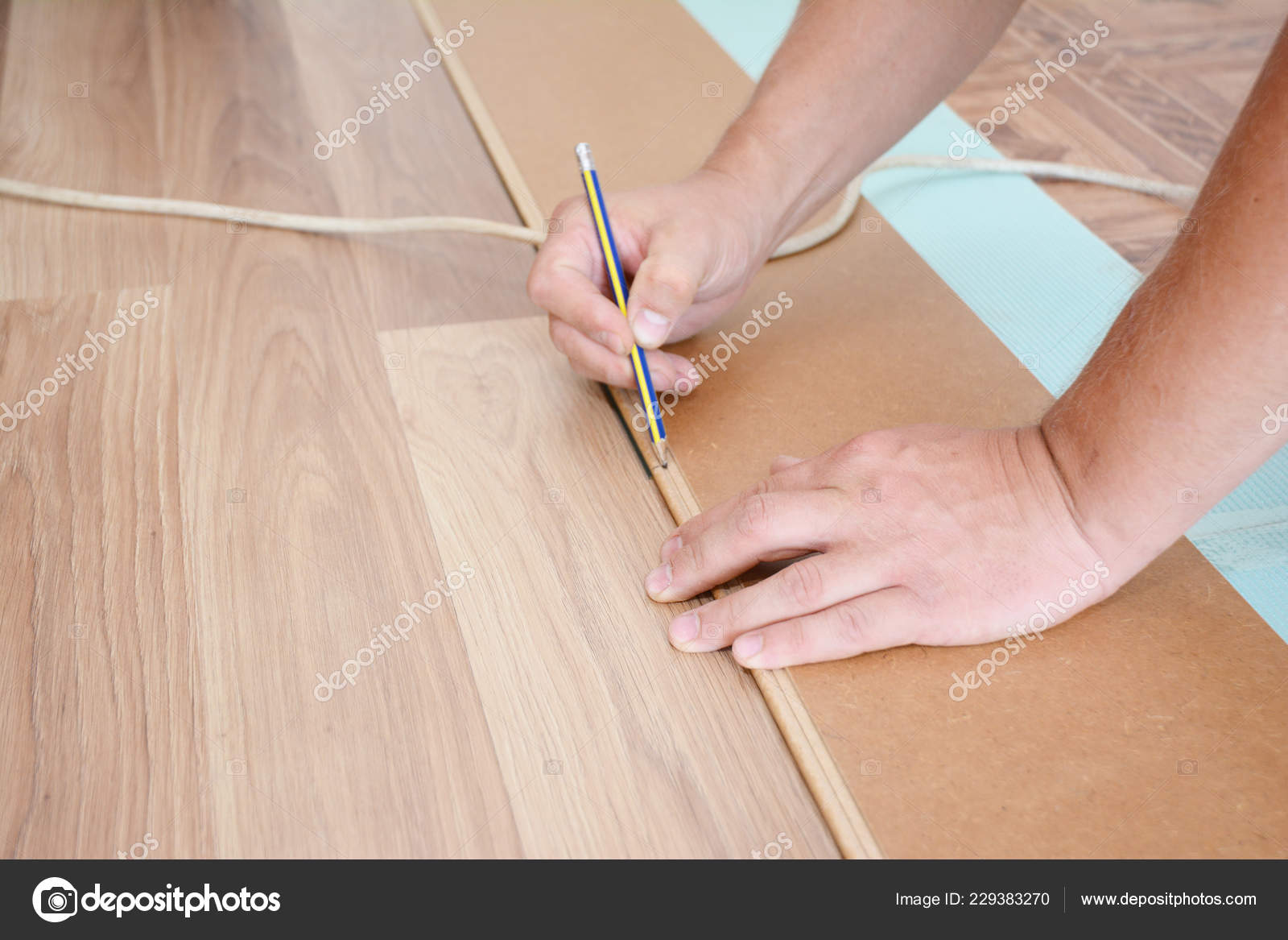 Contractor Laying Wooden Laminate Flooring Contractor Laying Wooden Laminate Flooring Installation Stock Photo