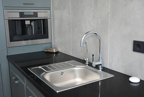 Modern kitchen sink, water tap and chrome faucet for kitchen basin