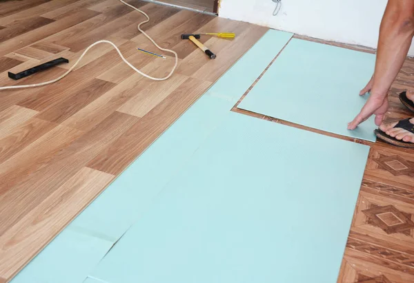 Flooring renovation with laminate flooring works.