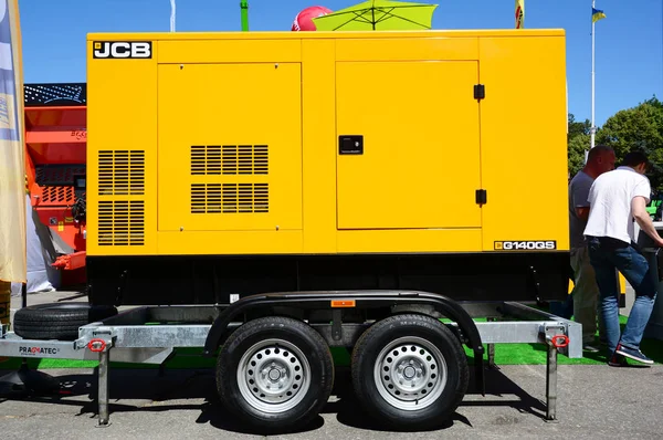 Standby power diesel backup generator for office with trailer wheels. — Stock Photo, Image