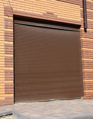 Metal roller shutter installation for house entance protection