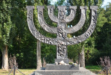 A menorah memorial dedicated to jewish people executed in 1941 in Babi Yar in Kiev by German forces. Holocaust. clipart