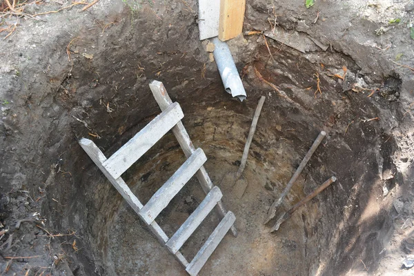 Dig hole in the ground for house septic tank — Stock Photo, Image