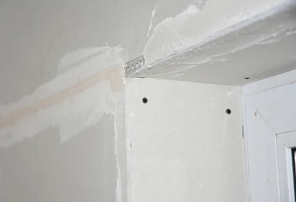 Close up on gypsum plasterboard plastering on window corner problem area — Stock Photo, Image