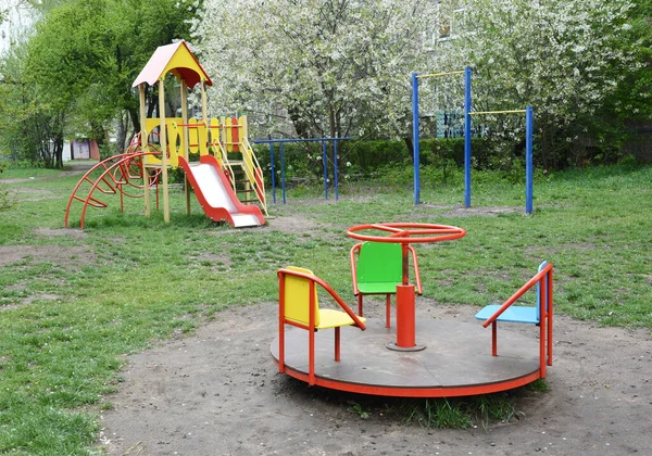 Empty Outdoor Playground Children Slide Carousel Pull Chin Bar Park — Stock Photo, Image