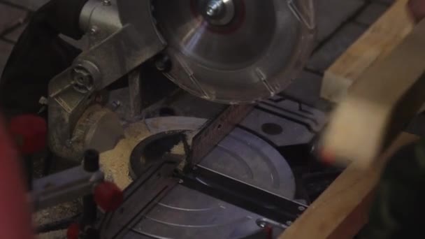 Veiw of process preparing wooden planks for cutting by new modern circular saw. — Stock Video