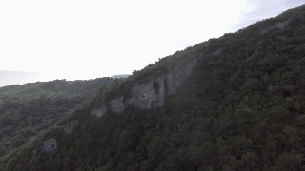 Beautiful view of green hill with cave , Black Sea and Abkhazian long shorecost — Stock Video