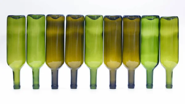 stock image empty bottles of wine on white background