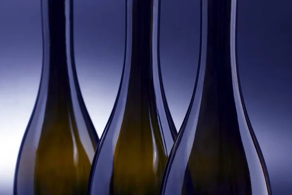 Three empty wine bottles close up