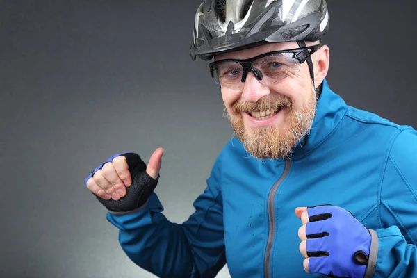 portrait of happy laughing bearded cyclist