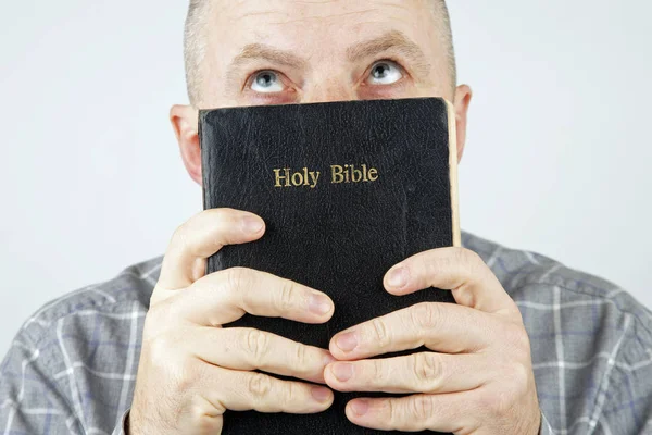Man Bible His Hands Looks — Stock Photo, Image