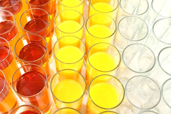 Many glasses with different juice. tableware for drink — Stock Photo, Image
