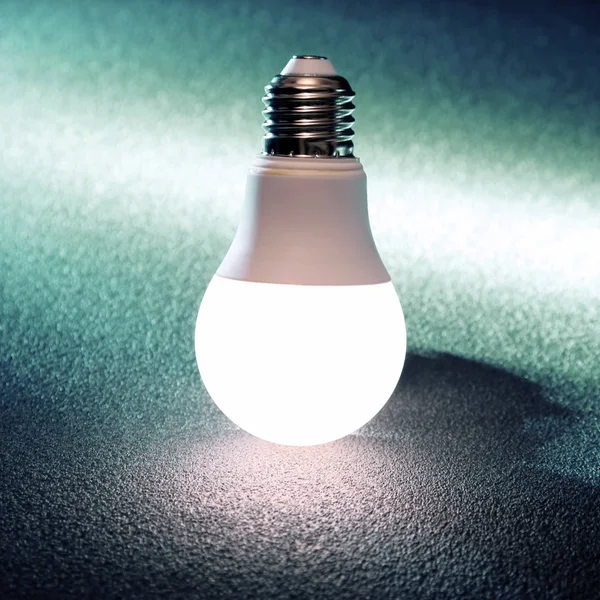 Moderna lampada a led è acceso su uno sfondo scuro — Foto Stock