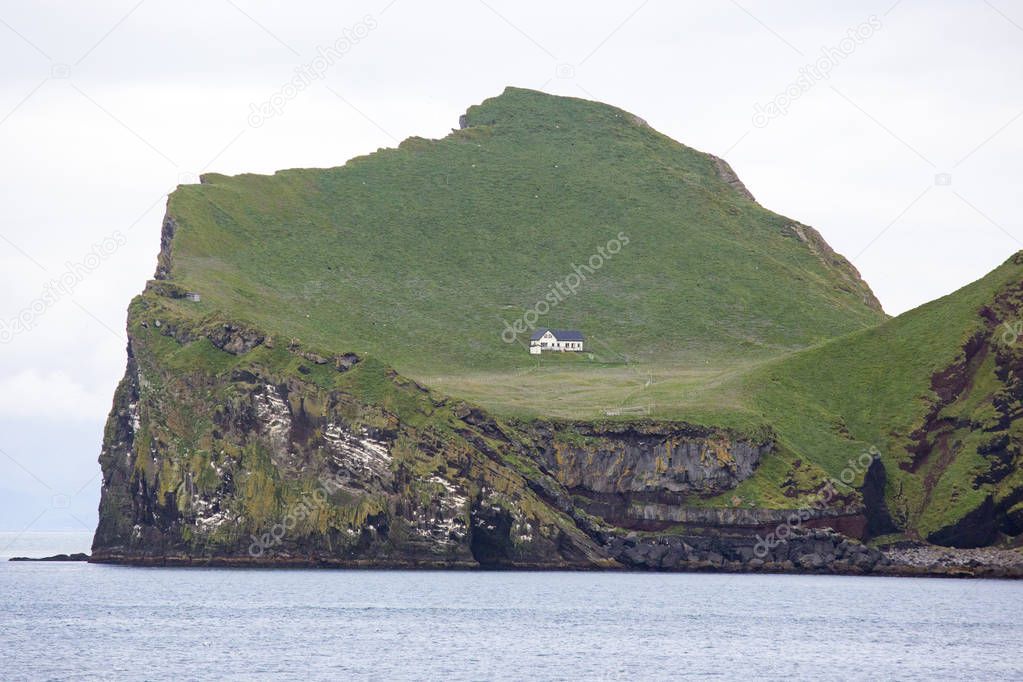 Lonely house on the Island of the Vestmannaeyjar archipelago. Ic