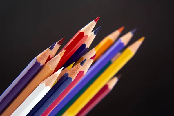 Colored pencils for drawing on a dark background. — Stock Photo, Image