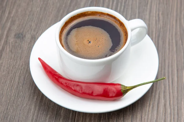White Cup Black Coffee Red Hot Pepper Wooden Frame Stock Image