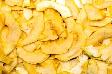Kurutulmuş kavun dilimlerinin dokusu ve arkaplanı. Meyve ve vitamin. Sağlıklı yemek.
