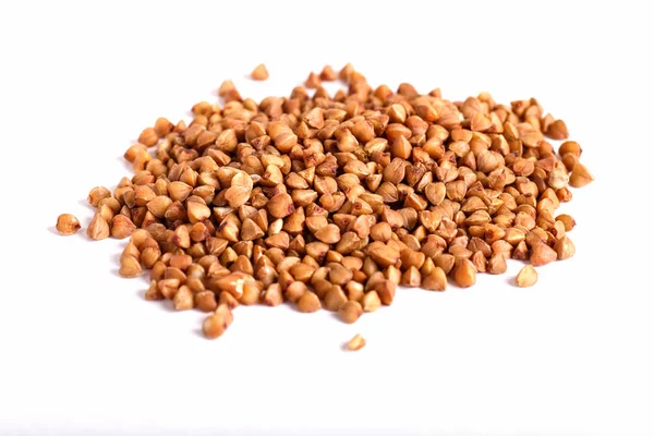 Pile of buckwheat isolated on white background. — Stock Photo, Image