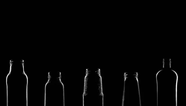 Sziluettek Palack Különböző Gyönyörű Formák Egy Fekete Háttér Banner Reklám — Stock Fotó