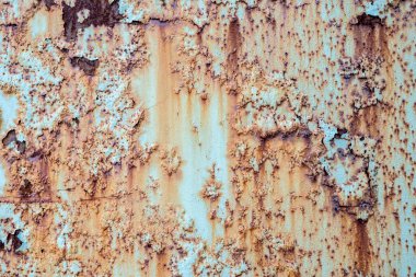 Eski metal yüzeyin arka plan ve dokusu mavi boya ve pas ile kaplıdır.