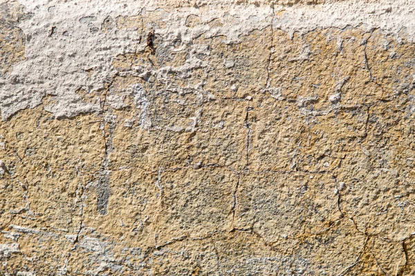 Φόντο και υφή του παλιού τσιμεντένιου τοίχου με ραγισμένο χρώμα πάνω του — Φωτογραφία Αρχείου