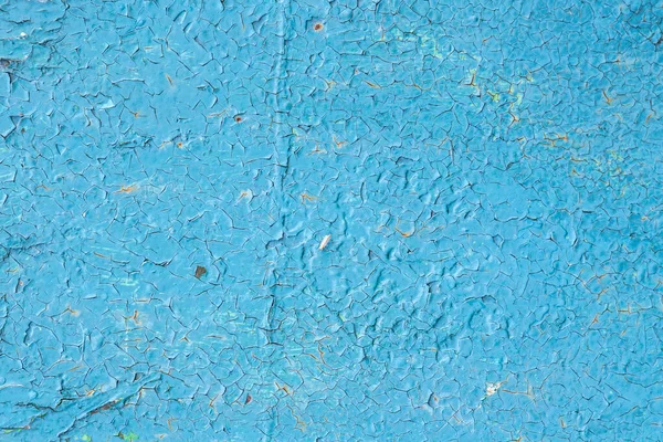 La surface du vieux métal, dénoyautée de rouille, recouverte d'une vieille peinture bleue — Photo