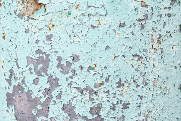 Текстурная бетонная стена с защищенной синей и зеленой краской крупным планом — стоковое фото