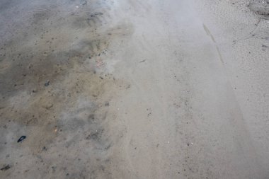 Sahil şeridinin arka planı ve dokusu temiz su ve kumdur.