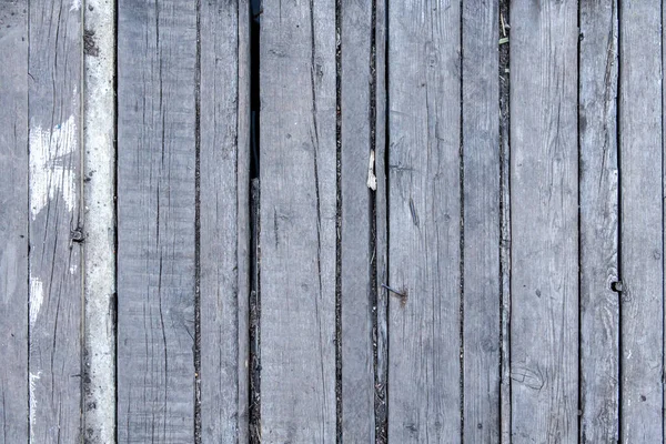 Textuur en achtergrond van houten omheining van oude bomen — Stockfoto