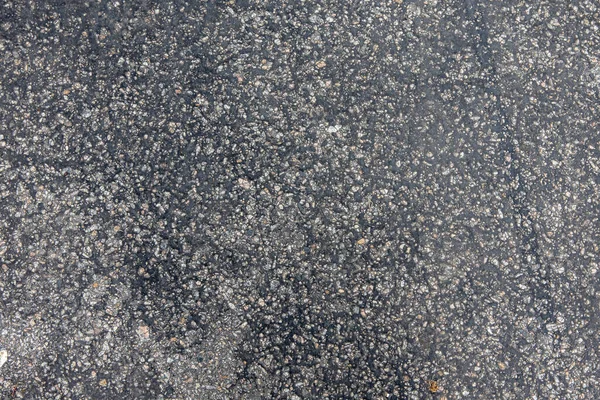 Fundo e textura da estrada de asfalto de granulação grossa — Fotografia de Stock