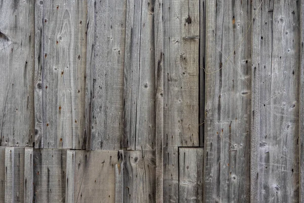 Achtergrond en textuur van oud houten oppervlak met sporen van verf — Stockfoto