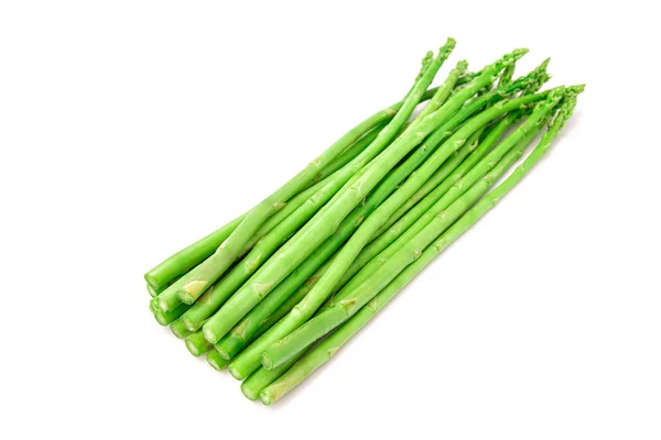 Asparagi. Asparagi freschi verdi chiari isolati su dorso bianco — Foto Stock