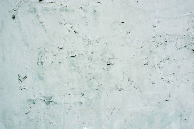 Arka plan mavi bir sıva ile kaplı ve boyalı dış, kaba dökme çimento ve beton duvar doku, dekoratif rustik kaplama